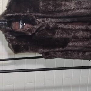 Faux fur vest by Olympia